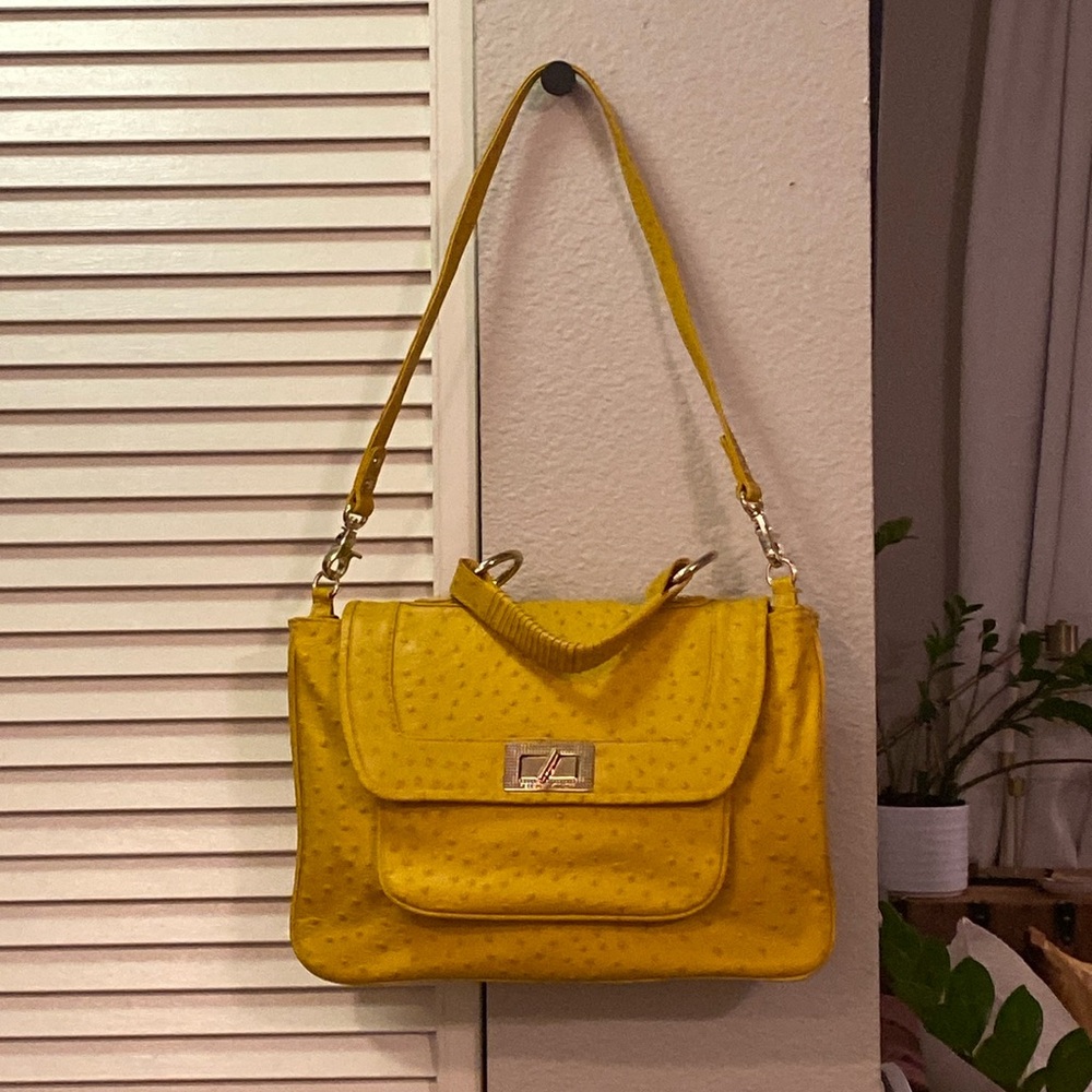 Rebecca Minkoff yellow ostrich pattern leather purse with straps. Never worn.